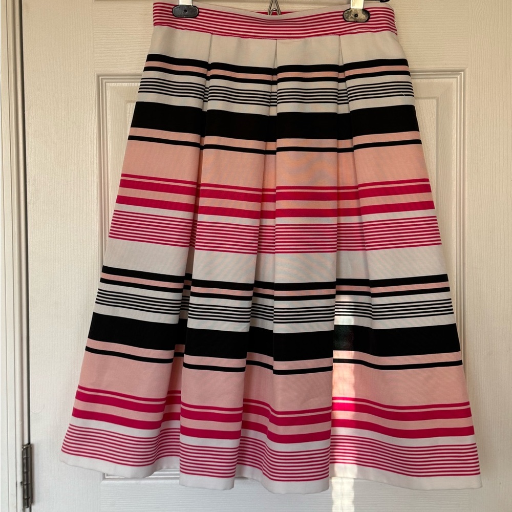 New York & Co pinks, white, and black stripe circle pleated skirt with pockets